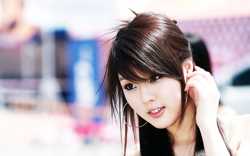woman with dark hair smiling