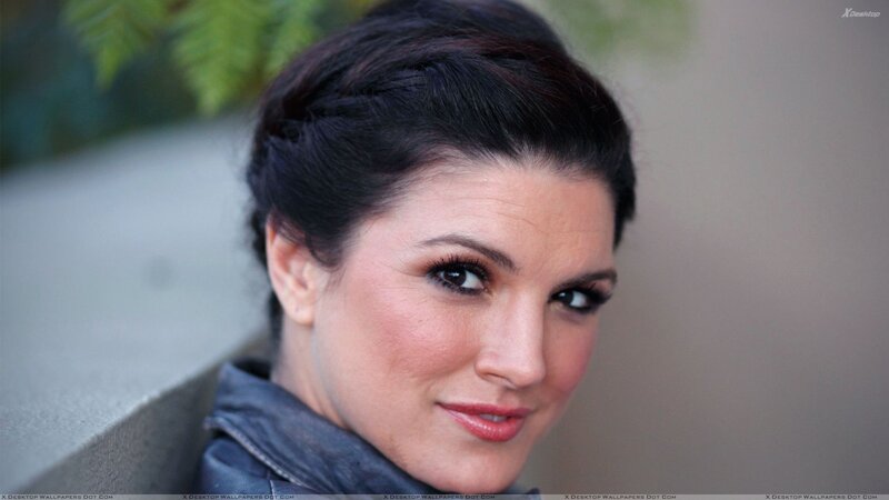 woman with dark hair smiling