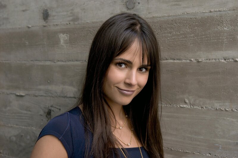 woman with dark hair smiling