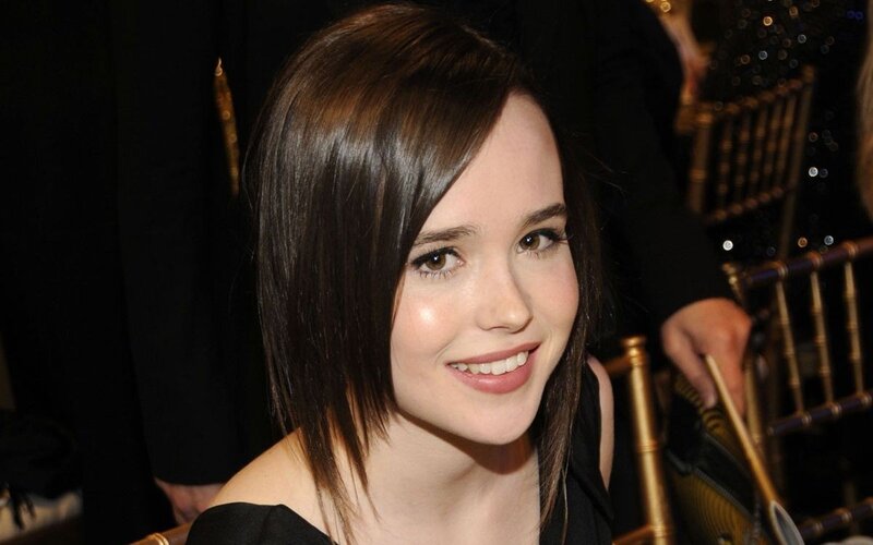 woman with dark hair smiling