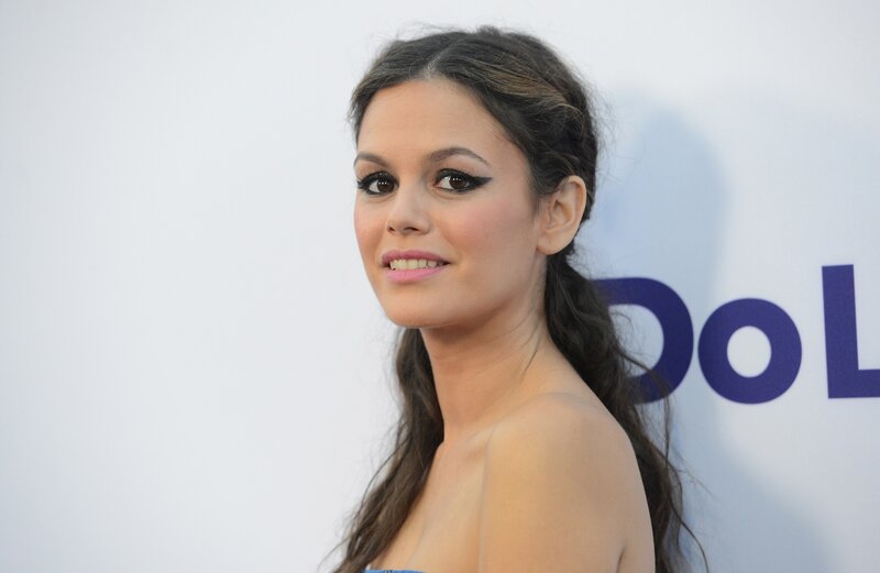 woman with dark hair smiling