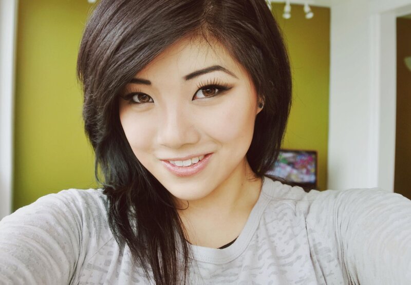 woman with dark hair smiling