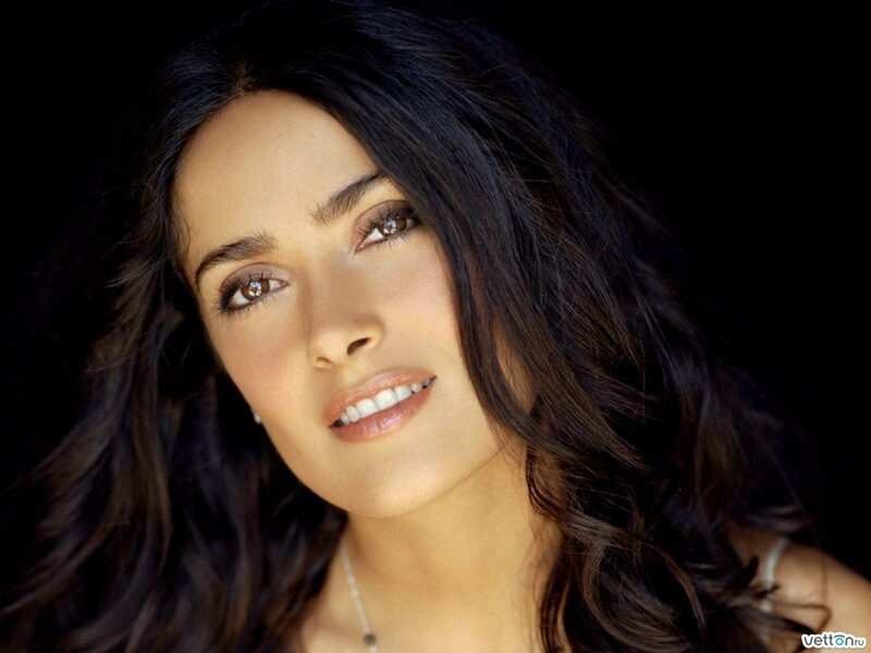 woman with dark hair smiling