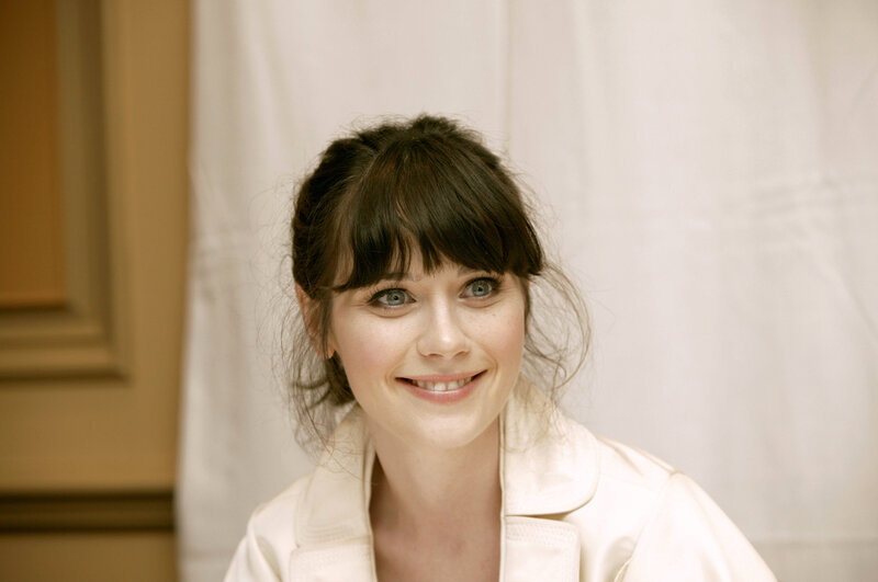woman with dark hair smiling
