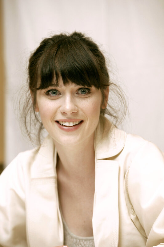 woman with dark hair smiling
