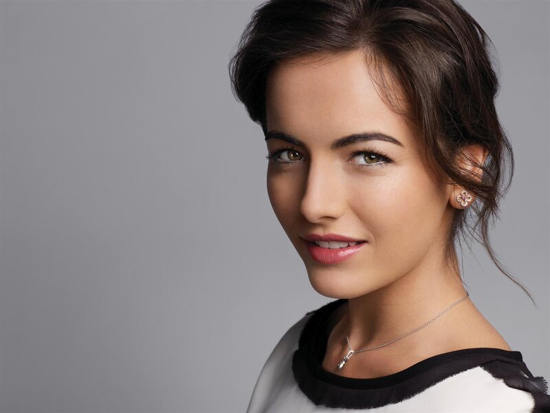 woman with dark hair smiling