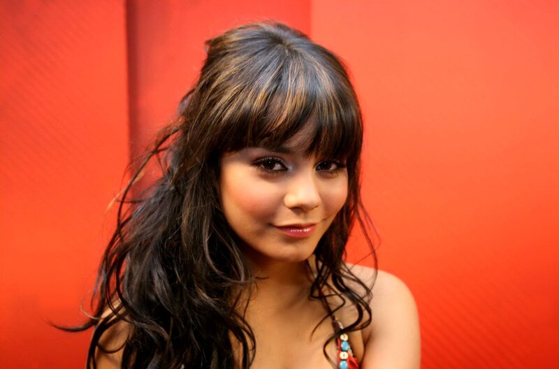 woman with dark hair smiling