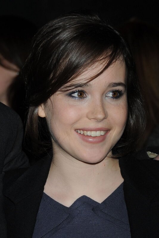 woman with dark hair smiling