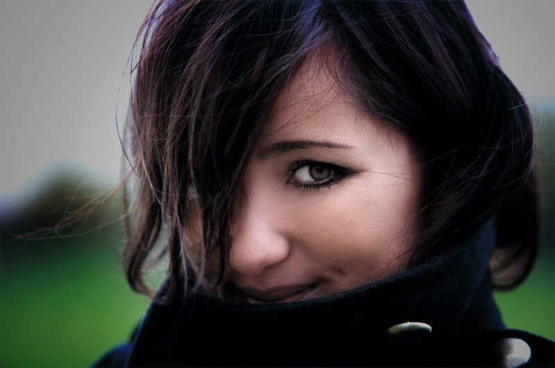 woman with dark hair smiling