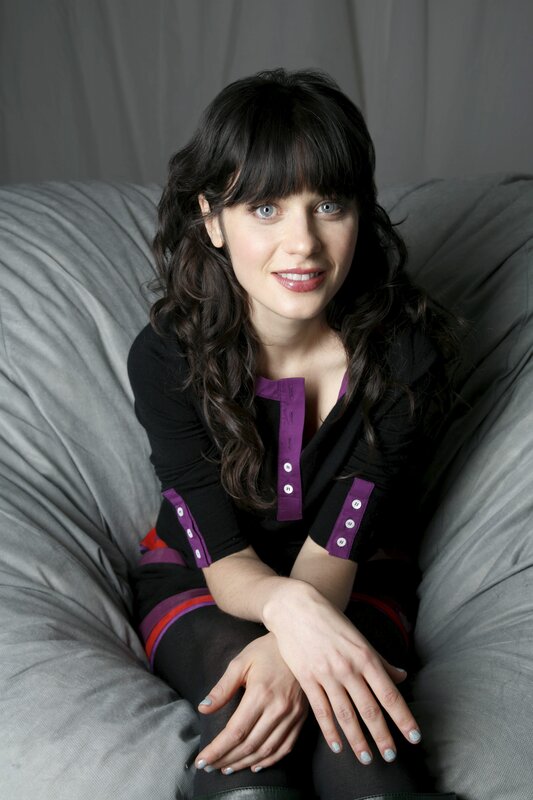 woman with dark hair smiling