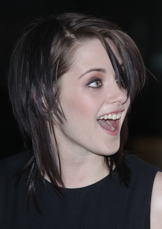 woman with dark hair smiling