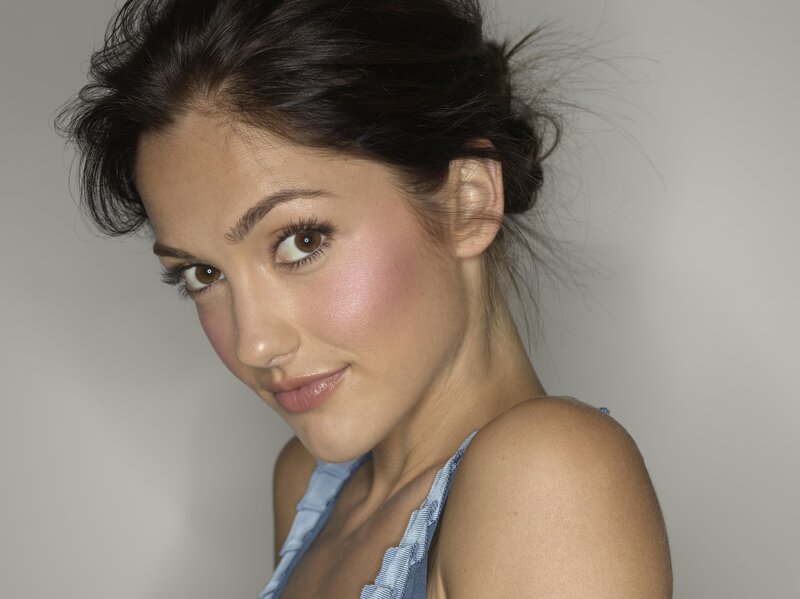 woman with dark hair smiling