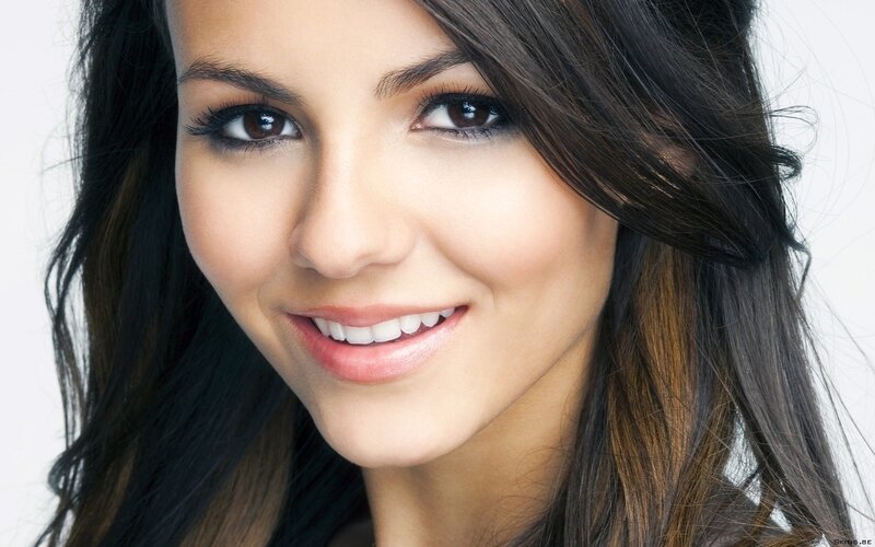 woman with dark hair smiling