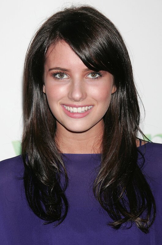 woman with dark hair smiling