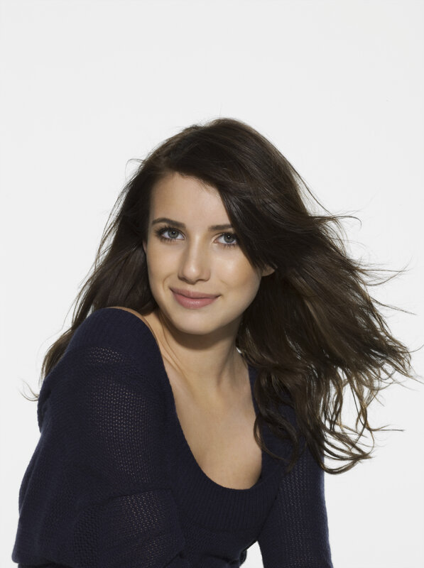 woman with dark hair smiling