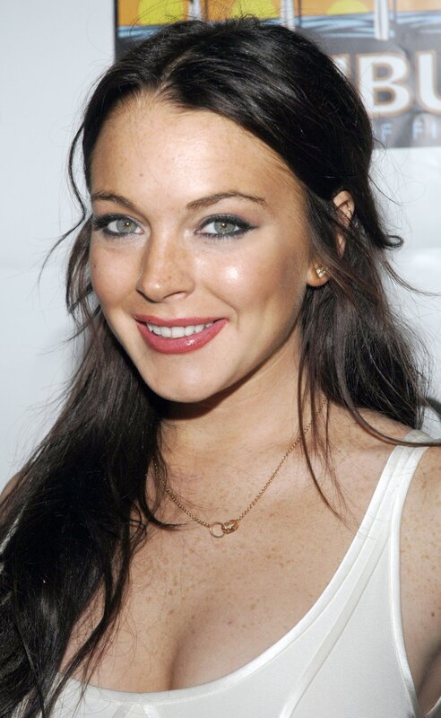 woman with dark hair smiling