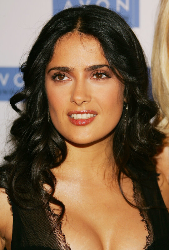 woman with dark hair smiling