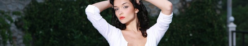 Woman with Dark Hair — White, Calm, Afternoon, Photograph, White Shirt, Green Bushes