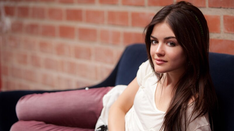 Woman with Dark Hair — White, Calm, Photograph, Brick Wall