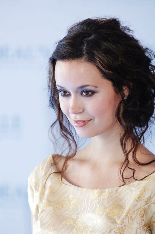 Woman with Dark Hair — White, Calm, Photograph, Gold Dress