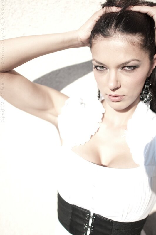 Woman with Dark Hair — White, Dramatic, Afternoon, Photograph