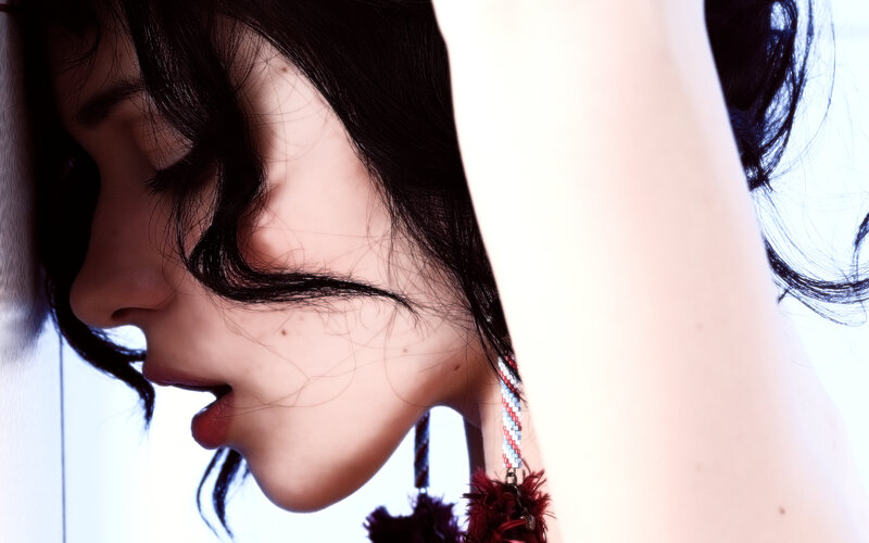 Woman with Dark Hair — White, Dramatic, Photograph, Earring, Arm