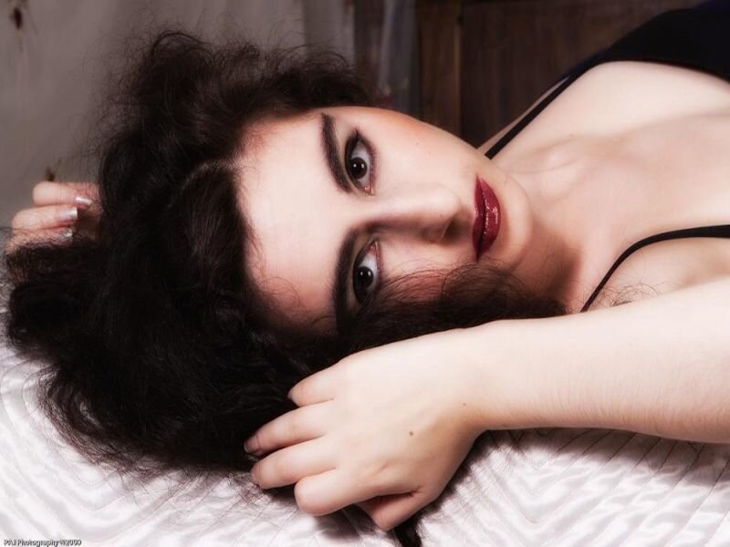 Woman with Dark Hair — White, Intimate