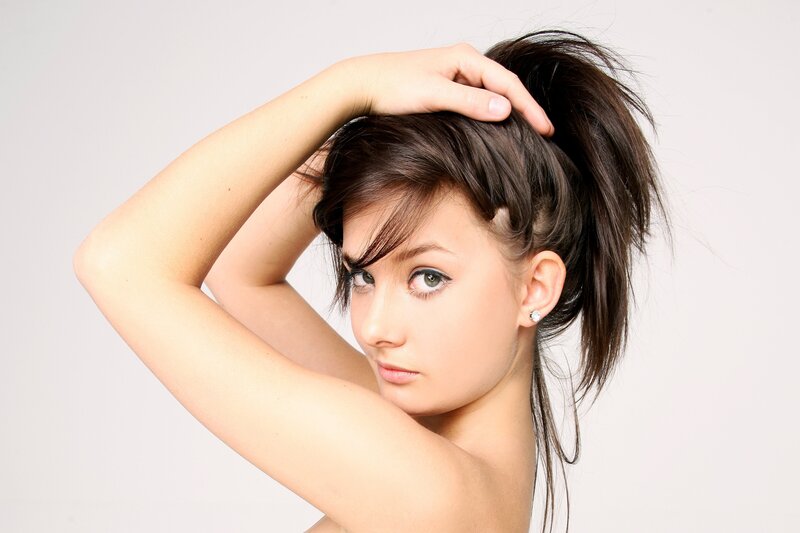 Woman with Dark Hair — White, Neutral, Photograph, Earring, Hand