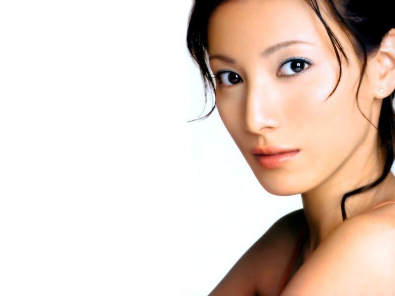 Woman with Dark Hair — White, Neutral, Photograph, Earring