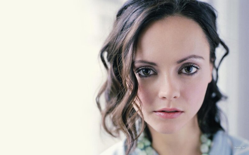 Woman with Dark Hair — White, Neutral, Photograph, Eyes, Necklace