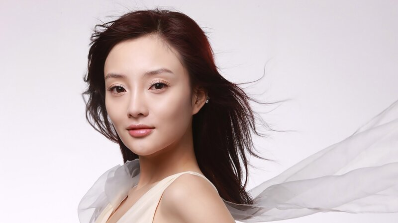 Woman with Dark Hair — White, Serene, Photograph, Earring, Fabric