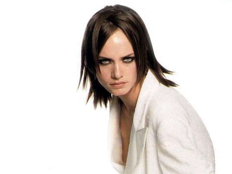 Woman with Dark Hair — White, Serious, Photograph, White Jacket
