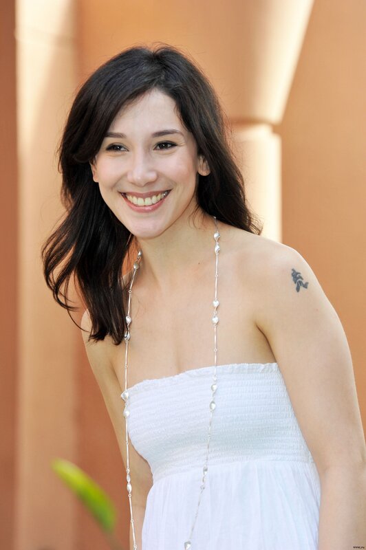 Woman with Dark Hair — White, Smiling, Afternoon