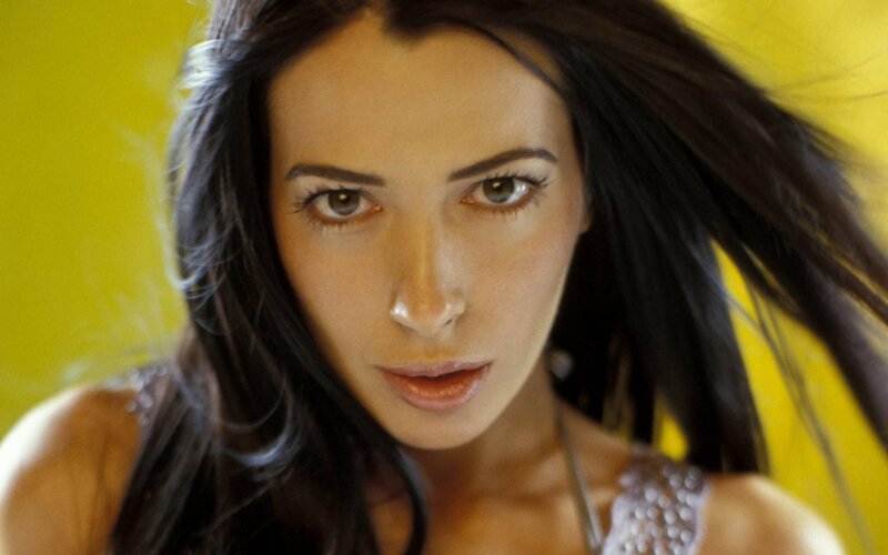 Woman with Dark Hair — Yellow, Intense, Photograph