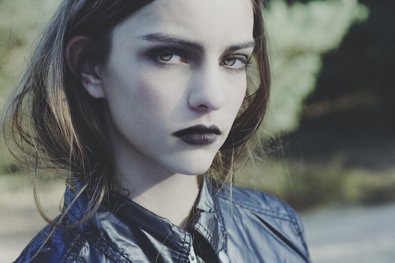 woman with dark lipstick