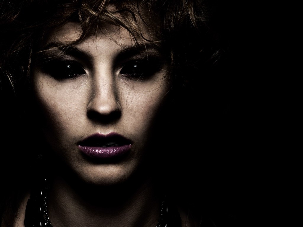 woman with dark makeup