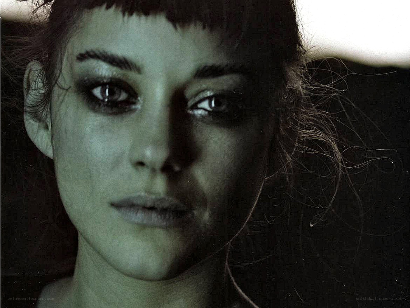 woman with dark makeup