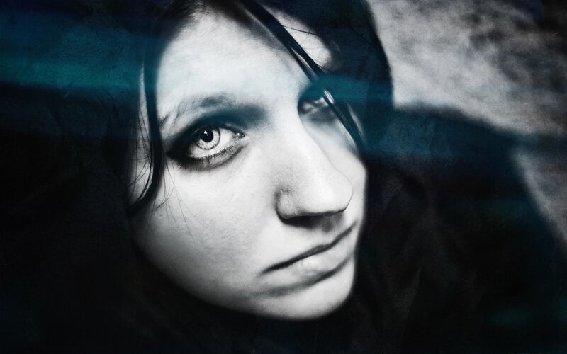 woman with dark makeup