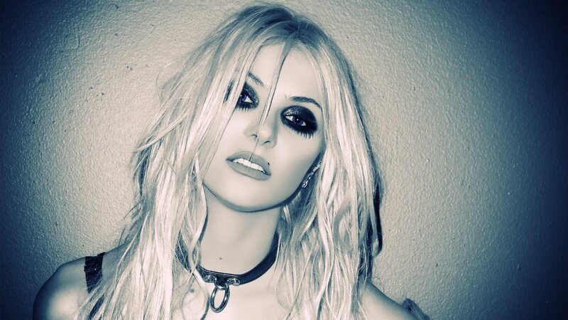woman with dark makeup and choker