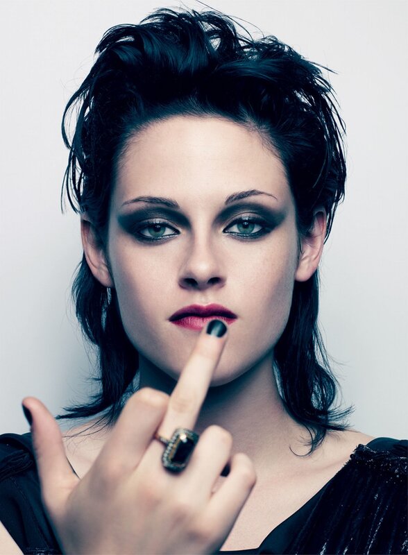 woman with dark makeup and ring