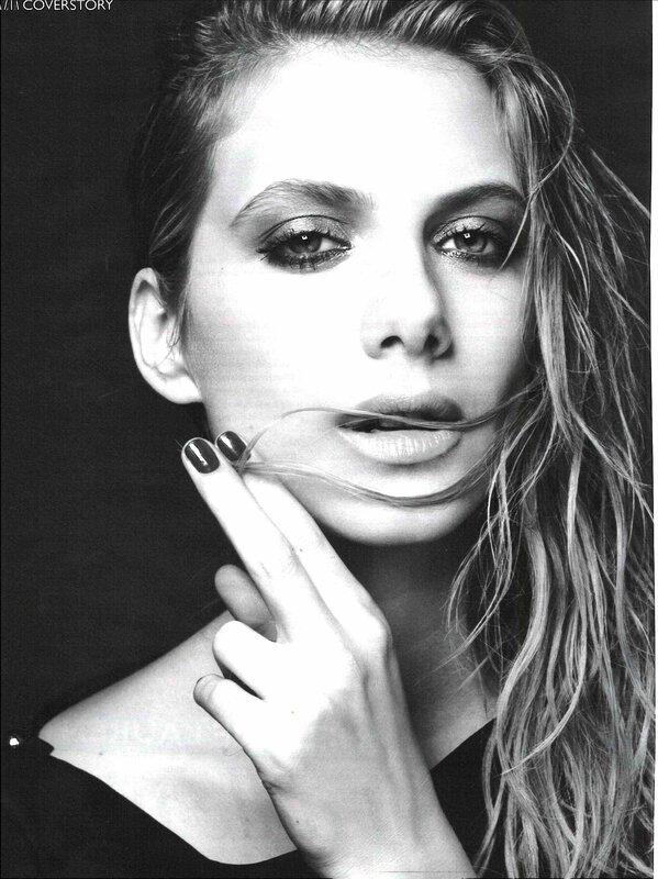 woman with dark nail polish