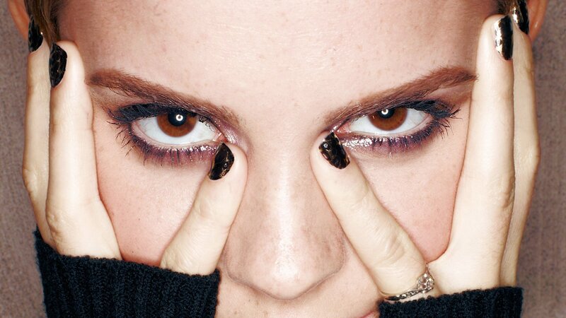 woman with dark nail polish