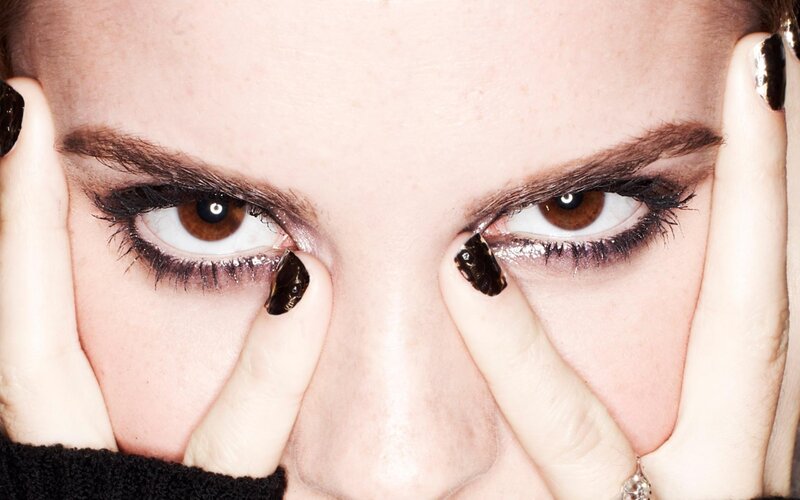 woman with dark nail polish