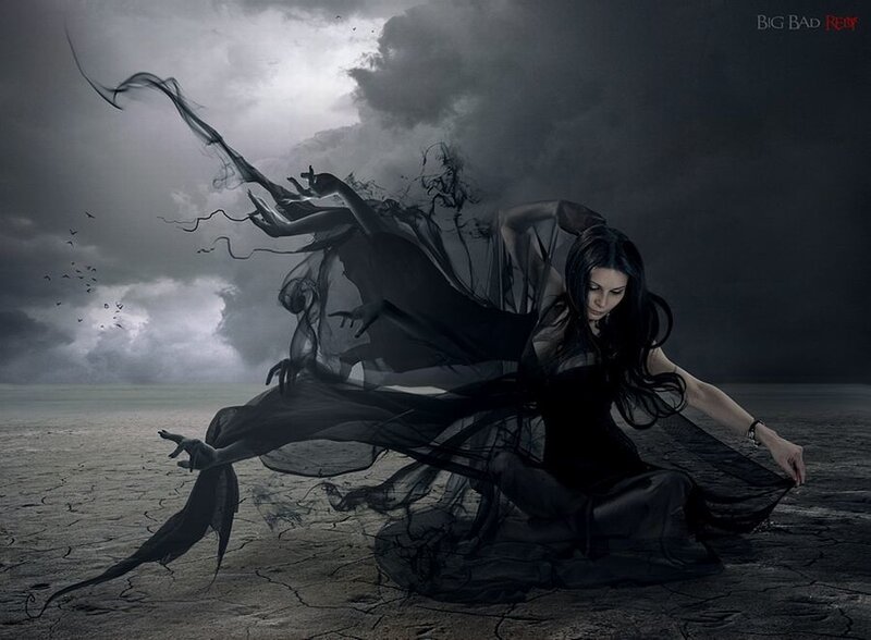 woman with dark spirit on barren land