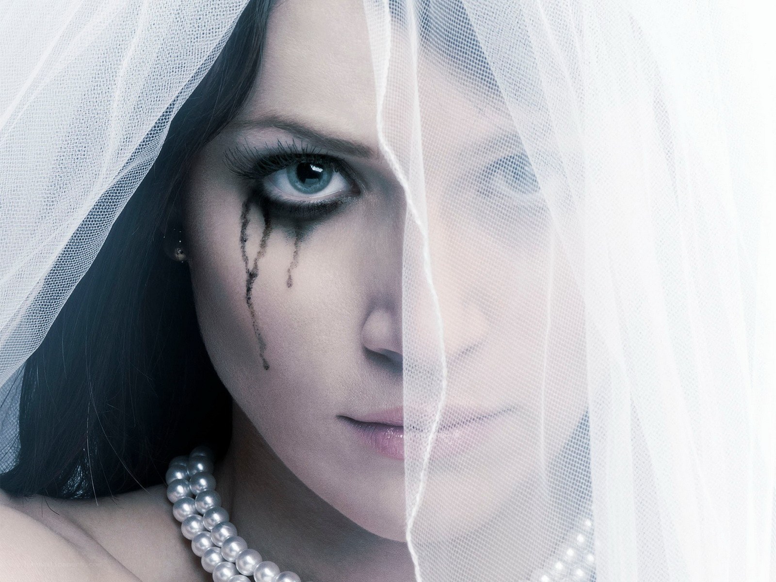 woman with dark tears