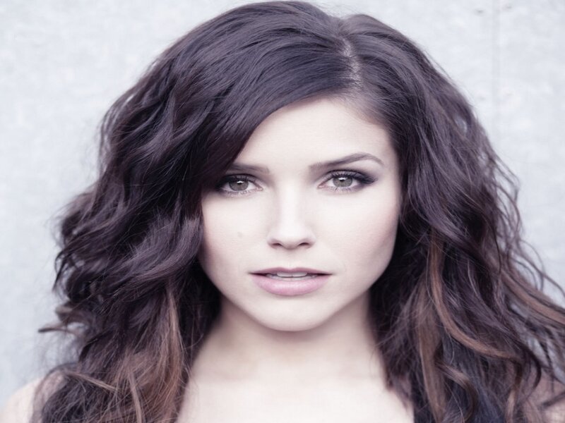 woman with dark wavy hair