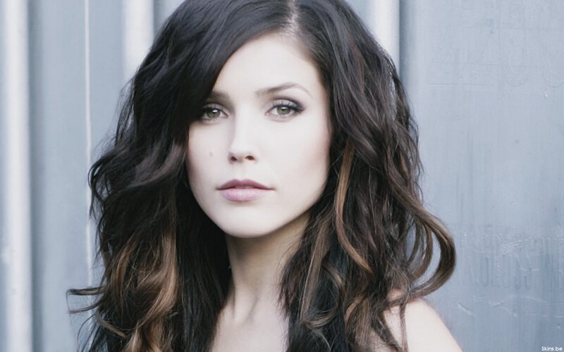 woman with dark wavy hair