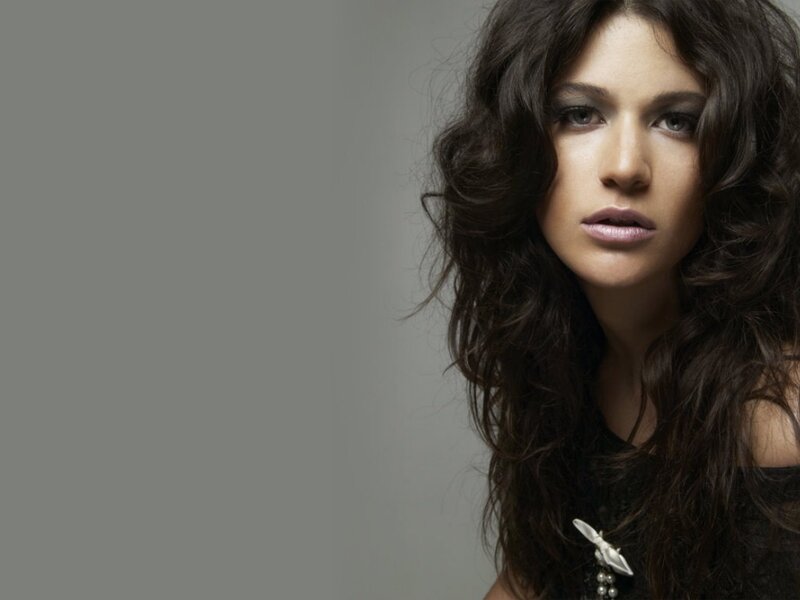 woman with dark wavy hair