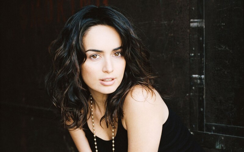 woman with dark wavy hair