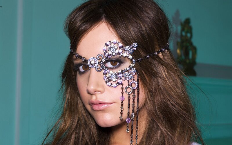 woman with decorative eye mask